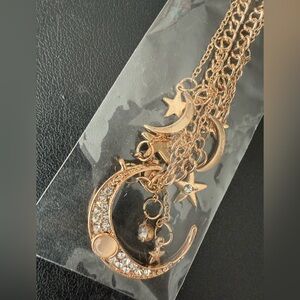 Elegant Gold Moon and Star Necklace, new